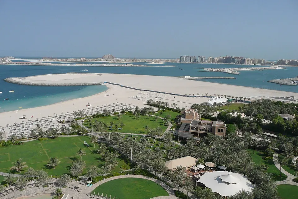 Palm Jumeirah shoreline, resort grounds, and Arabian Gulf